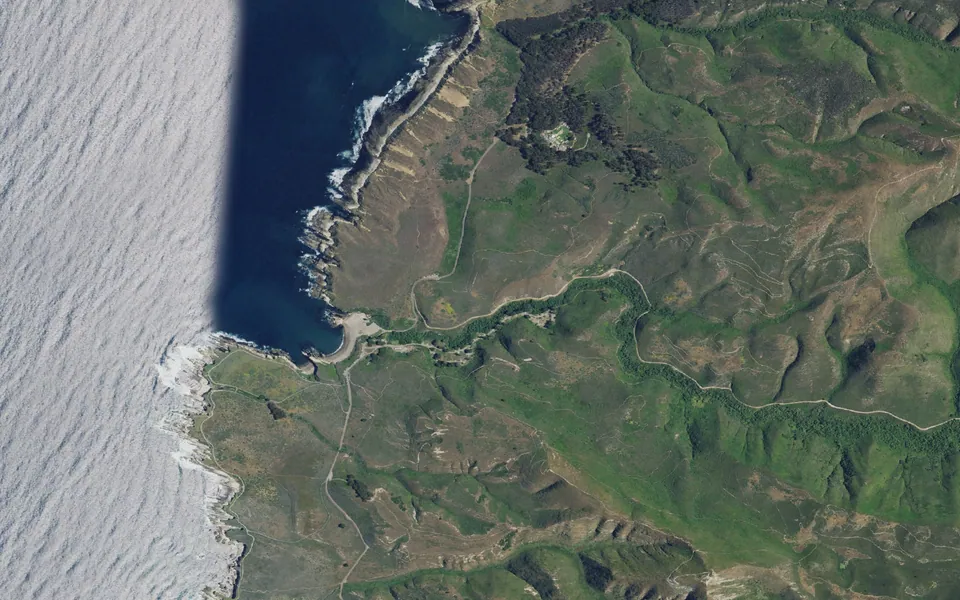 Aerial view centered on Montaña de Oro Environmental Camps