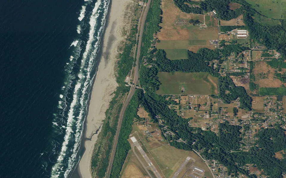 Aerial view centered on Clam Beach County Park Campground