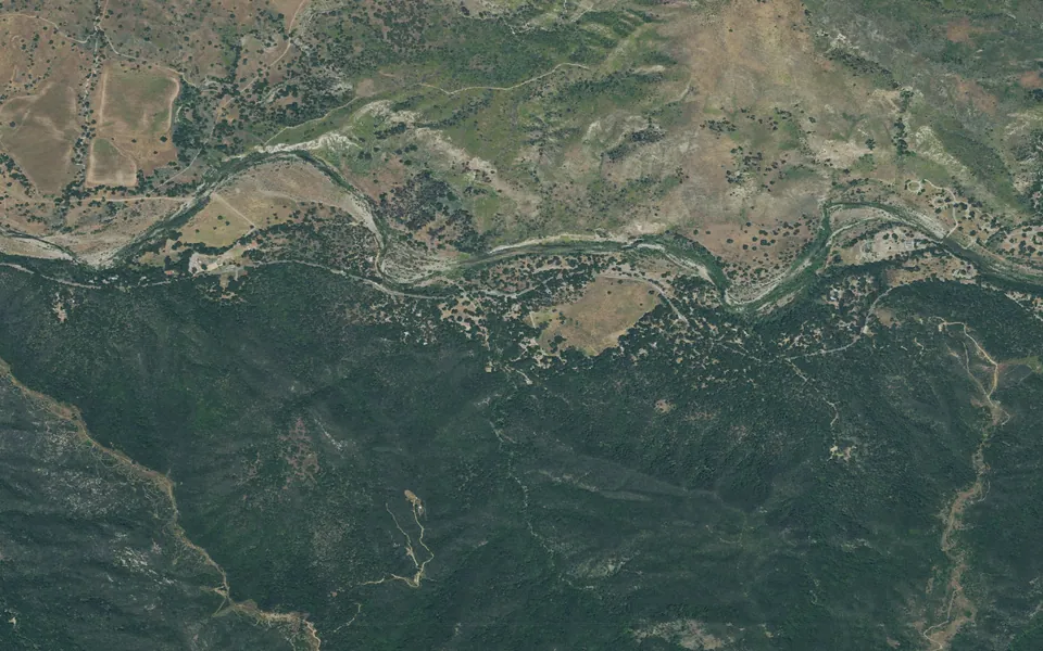 Aerial view centered on Los Prietos
