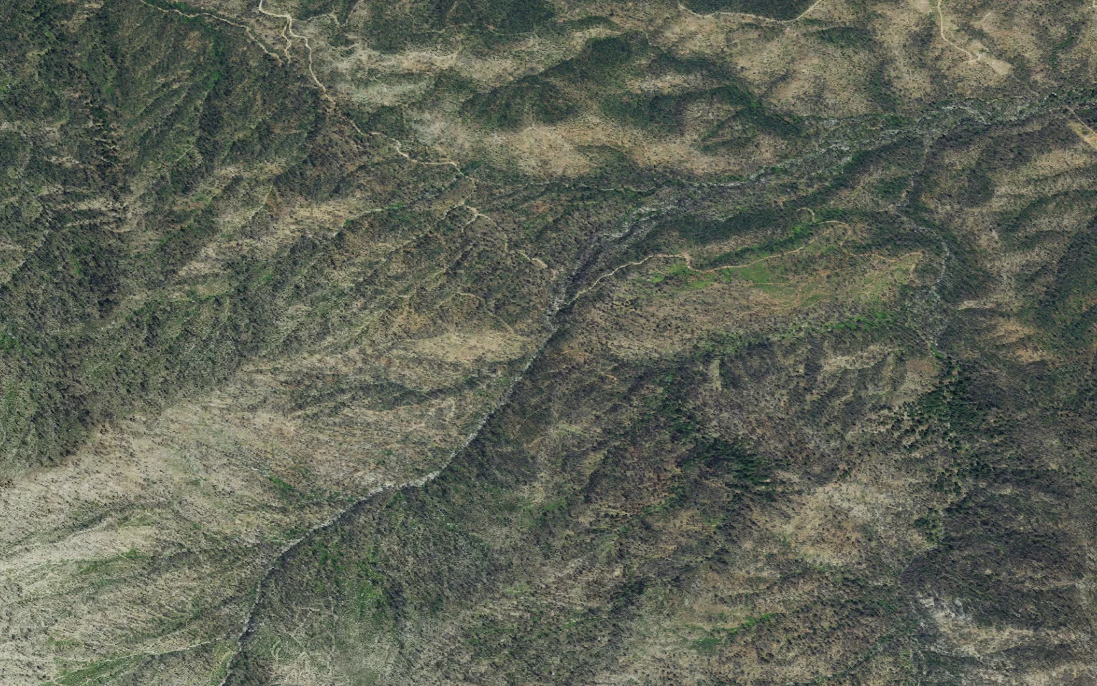 Aerial view centered on Upper Boulder Creek Legal Camping Area camp area