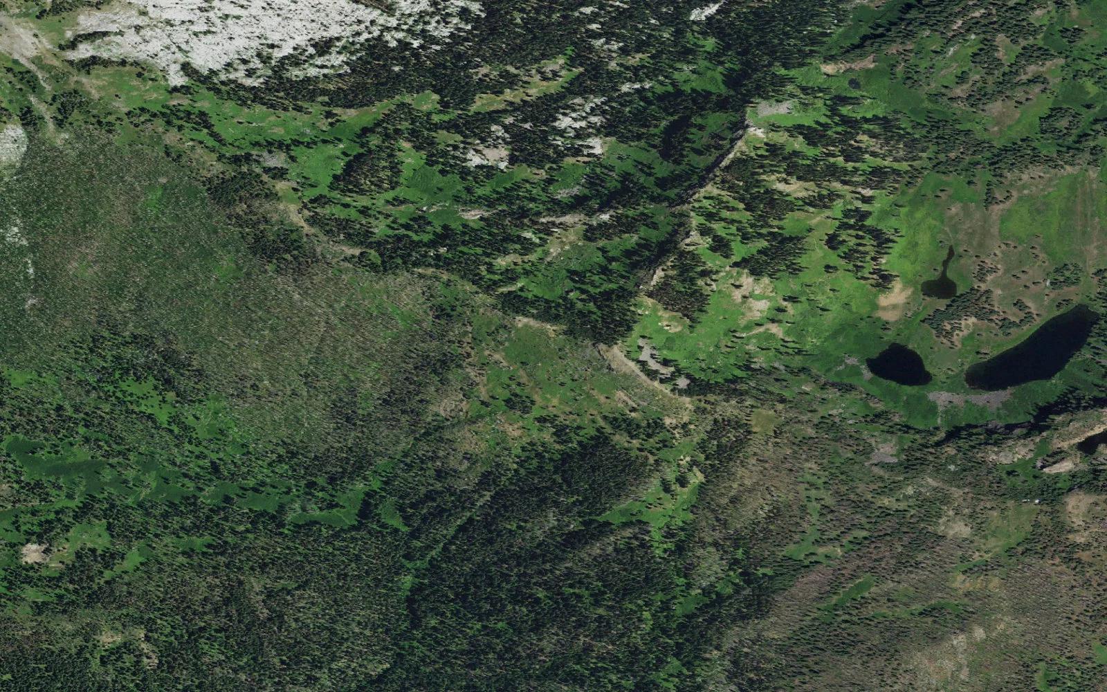 Aerial view centered on Upper Sky High Lake camp area