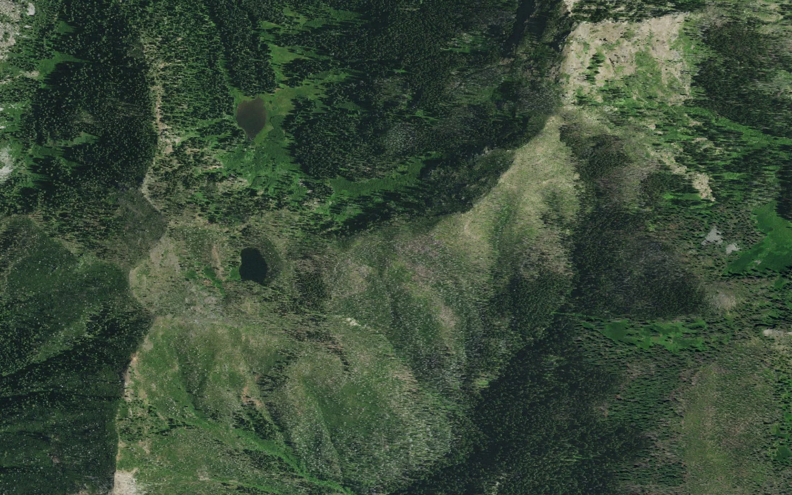 Aerial view centered on Let’er Buck Trailhead