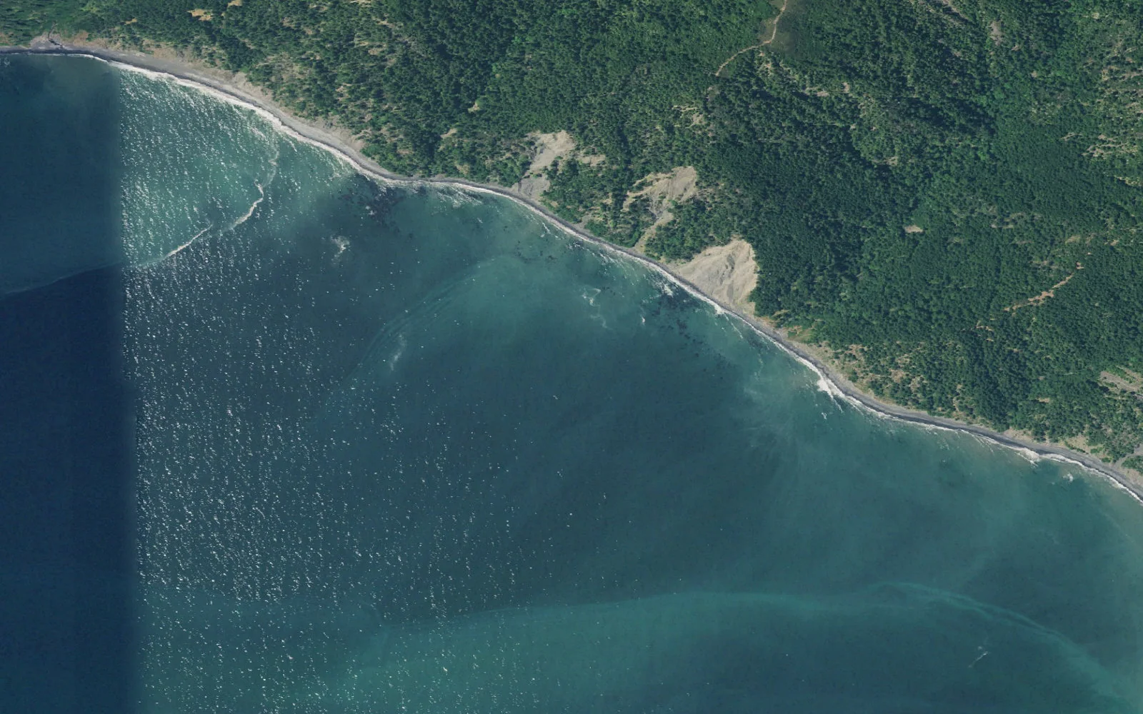 Aerial view centered on Buck–Shipman Creeks camp area