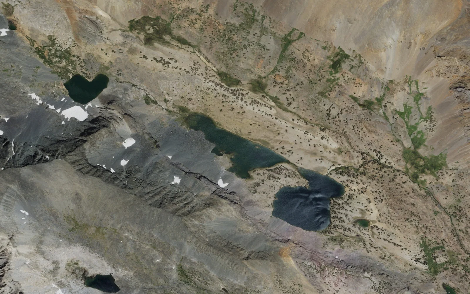 Aerial view centered on Alger Lakes